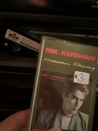 The box in my hand and the cassette in the player.