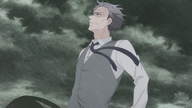 Screenshot from Tadaima, Okaeri. The granddad is facing the raining skies, being angry cause the flight he was supposed to go home with to see his grandkids, is being cancelled.