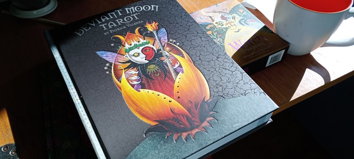 Patrick Valenza's Deviant Moon Tarot book. And a Seasons of the Witch Litha deck.