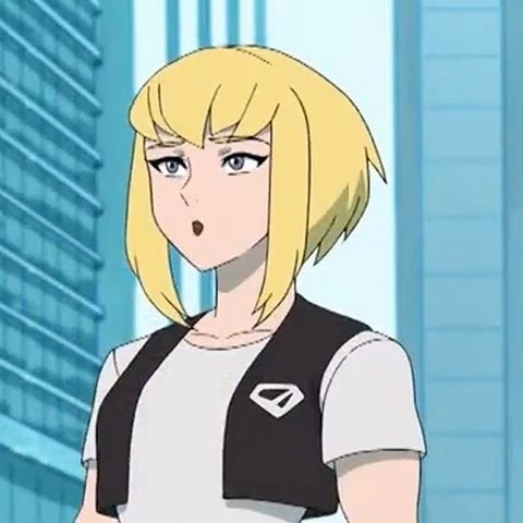 Kara from My Adventures With Superman, She has blonde hair, and is wearing a white shirt and a black vest with a white shield logo on it.