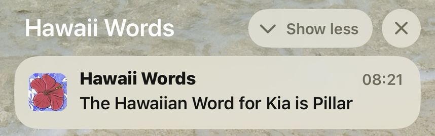 Screenshot of an iPhone lock screen with a notification from the Hawaiian Words Dictionary app that says “the Hawaiian Word for Kia is Pillar”
