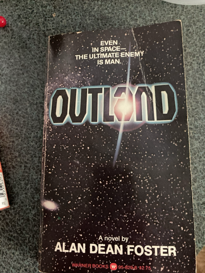 Paperback book cover for Outland, novelization by Alan Dean Foster.