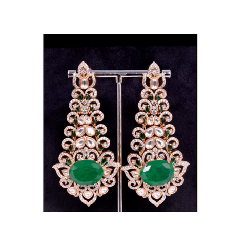 Find the perfect pair of green stone earrings to complement your style. browse our latest collection of american diamond earrings, crafted with copper and brass metals, adorned with green semi-precious stones and small zircon white stones at best price.