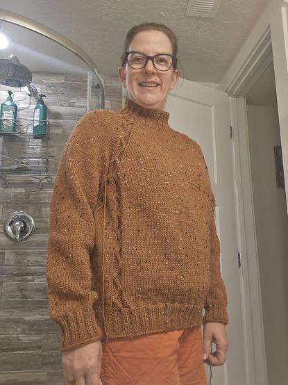 Pumpkin colored, tweed turtleneck sweater with raglan sleeves