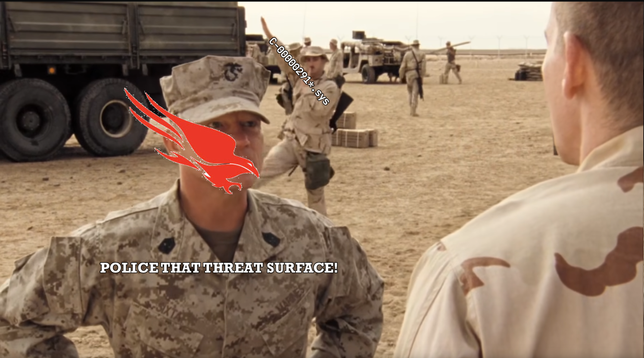 A screenshot from Generation Kill, with Sgt Major Sixta yelling “Police that mustache!” and another Marine goosestepping behind him. Sixta’s face is covered by the CrowdStrike logo, he’s actually yelling “Police that threat surface!”, and the goosestepper is labeled “C-00000291*.sys“ .
