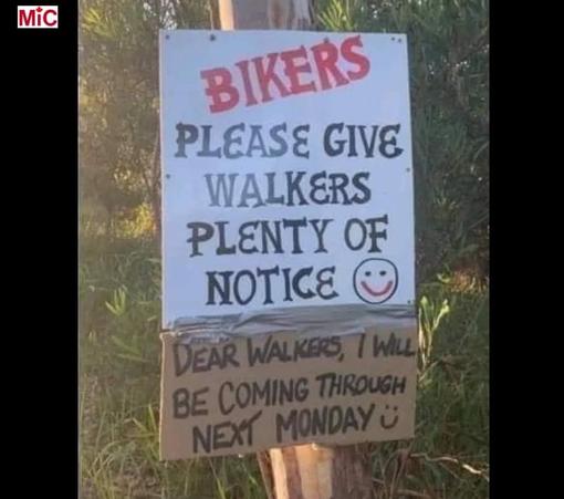 Sign on trail:
Bikers please give walkers plenty of notice
Graffiti under sign:
Dear walkers, I will be coming through next Monday 