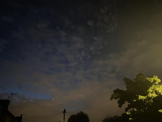 Cloudy night skies over London UK