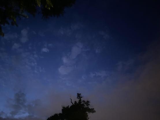 Cloudy night skies over London UK