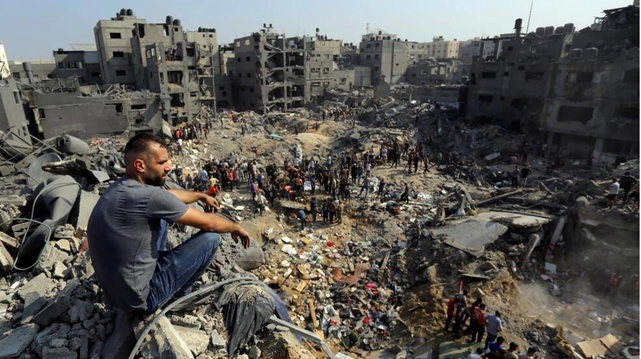 A Gazan surveys the destruction after Israeli airstrikes in the Jabalia refugee camp in northern Gaza