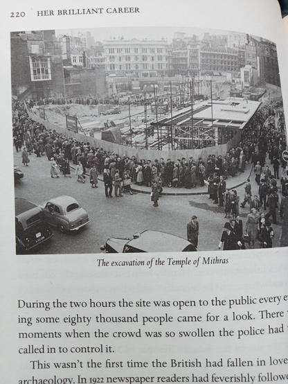 Hundreds of people queue around the corner for a glimpse of the Temple of Mithras while it's being excavated in 1954