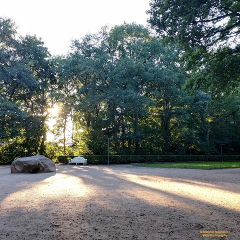 a park entrance in sweet, golden evening light.