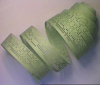 Unspooled roll of paper computer punch tape
