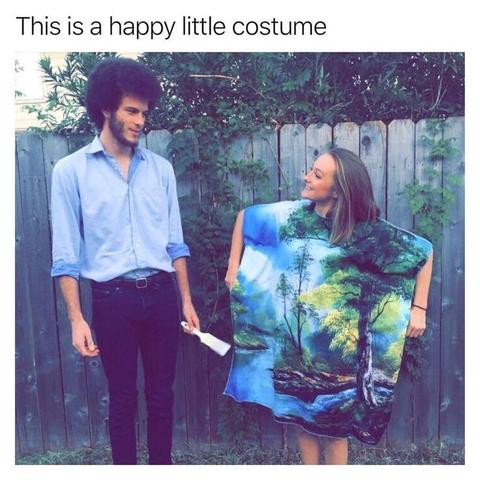 This is a happy little costume 

Photo of a guy dressed as Bob Ross and a girl dressed as a painting