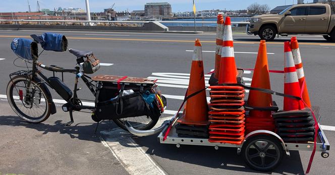 A Big Dummy with trailer attached, and the trailer is loaded with Awareness Cones (and they are heavy).  The cones are slightly lashed in place.